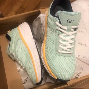 Mint Green Athletic Sneakers with Yellow Accent